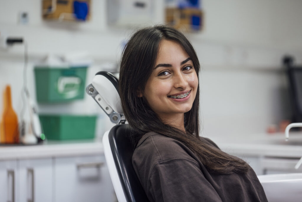 Teen girl in exam chair getting braces, Same Day Braces in Issaquah and Sammamish